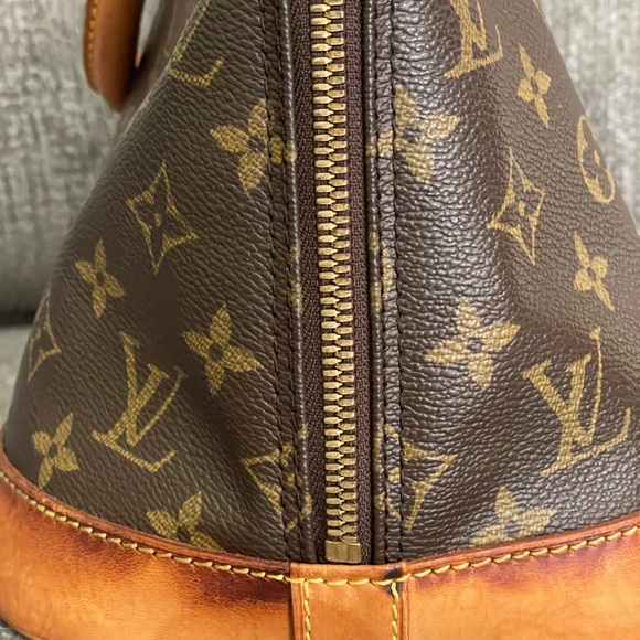 AUTHENTIC Monogram Alma PM Louis Vuitton bag authenticated by Authentic Street. - Picture 5 of 13